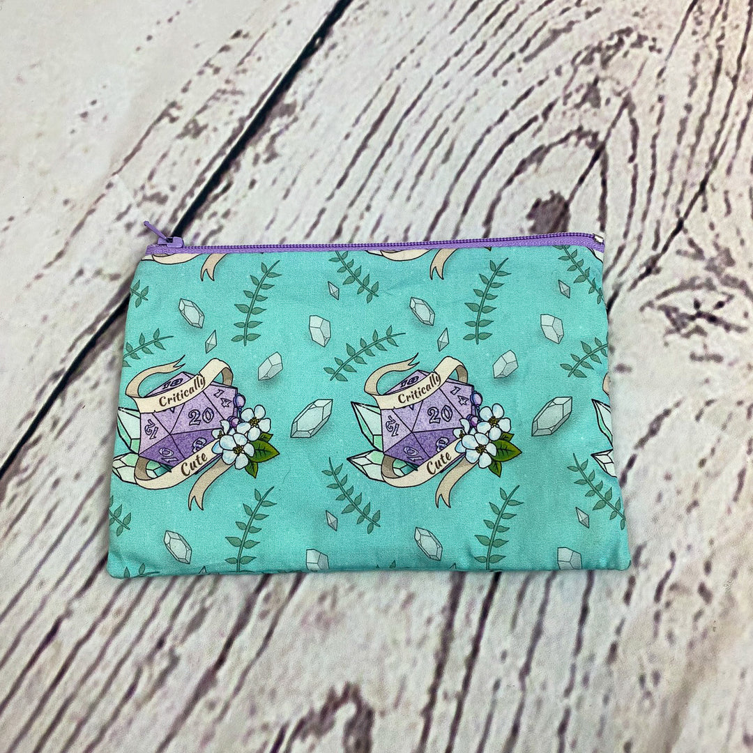 a small pouch with a picture of a fish on it