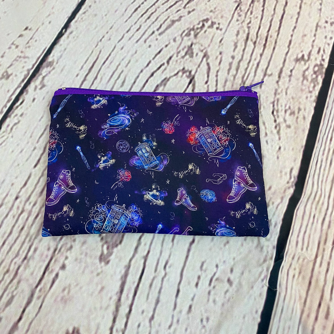 a purple and blue bag with a pattern on it