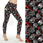 Load image into Gallery viewer, a woman in black and red leggings with a pattern of black and red
